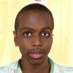 Neutral black young-adult male with short  brown hair and brown eyes