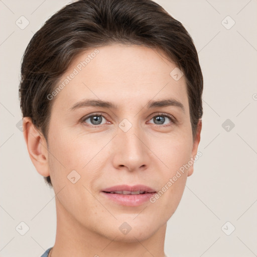 Joyful white young-adult female with short  brown hair and grey eyes