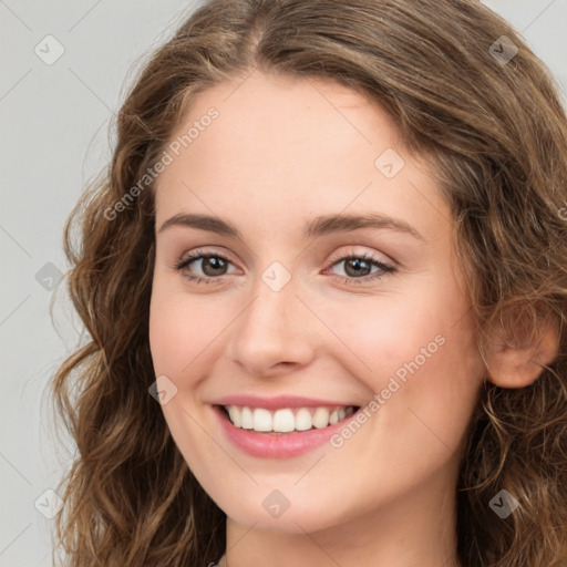 Joyful white young-adult female with long  brown hair and green eyes