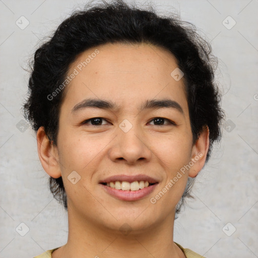 Joyful latino young-adult male with short  brown hair and brown eyes