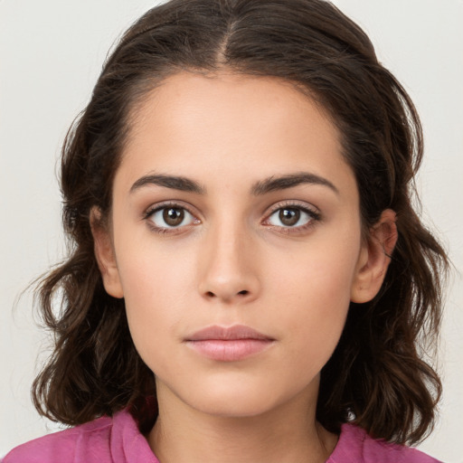 Neutral white young-adult female with long  brown hair and brown eyes