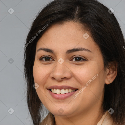 Joyful latino young-adult female with long  brown hair and brown eyes