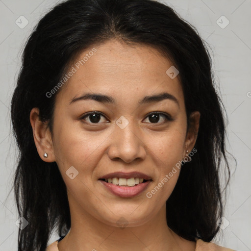 Joyful latino young-adult female with medium  brown hair and brown eyes