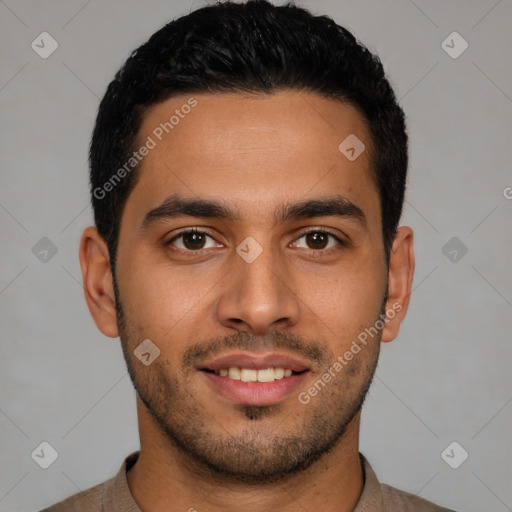 Joyful latino young-adult male with short  black hair and brown eyes