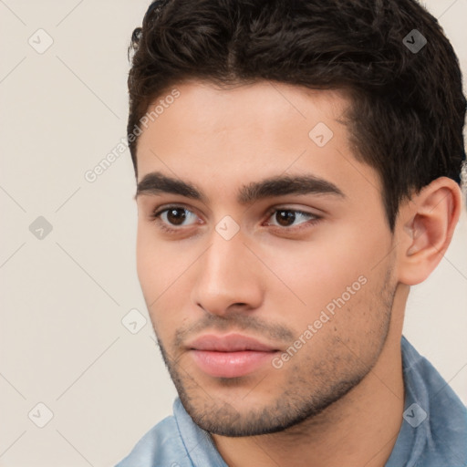 Neutral white young-adult male with short  brown hair and brown eyes