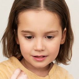 Neutral white child female with medium  brown hair and brown eyes