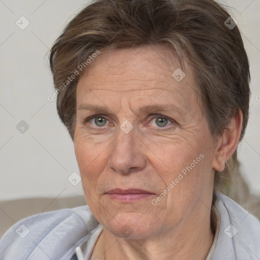 Joyful white middle-aged female with short  brown hair and brown eyes