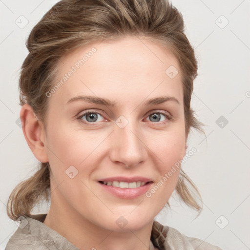 Joyful white young-adult female with medium  brown hair and blue eyes