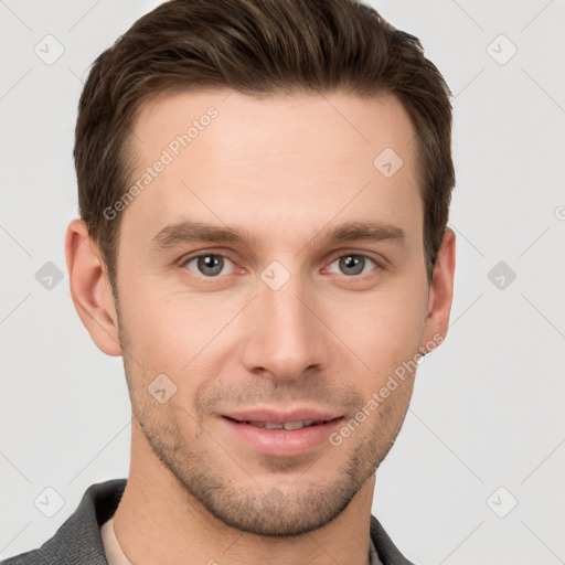 Joyful white young-adult male with short  brown hair and grey eyes