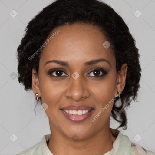 Joyful black young-adult female with medium  brown hair and brown eyes