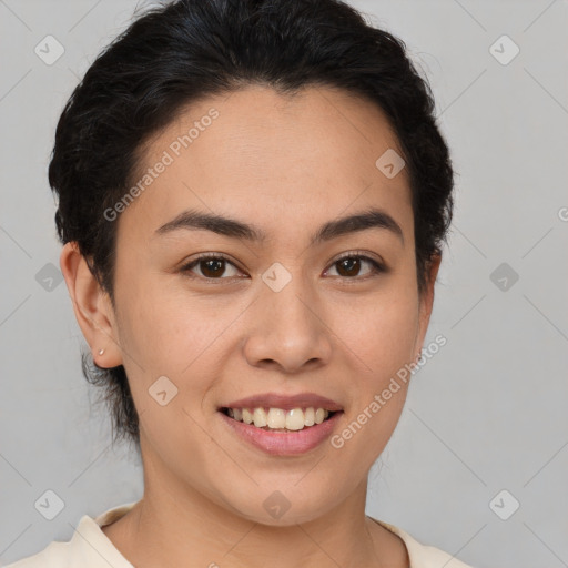 Joyful latino young-adult female with short  brown hair and brown eyes