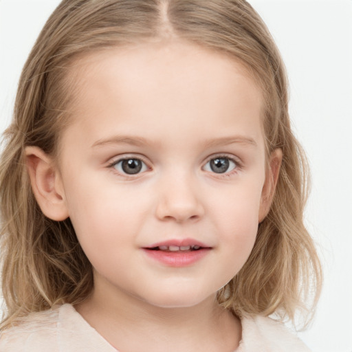 Joyful white child female with medium  brown hair and grey eyes