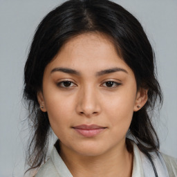 Neutral asian young-adult female with medium  black hair and brown eyes