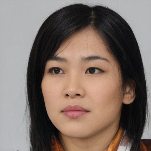 Neutral asian young-adult female with medium  black hair and brown eyes