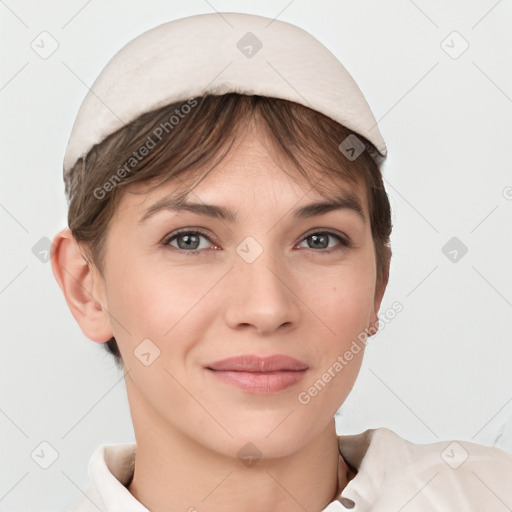 Joyful white young-adult female with medium  brown hair and grey eyes