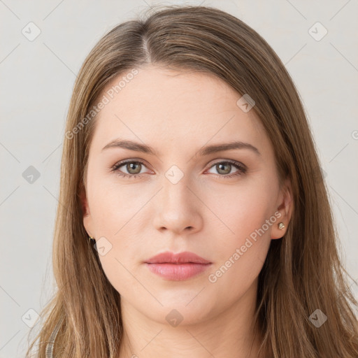 Neutral white young-adult female with long  brown hair and brown eyes