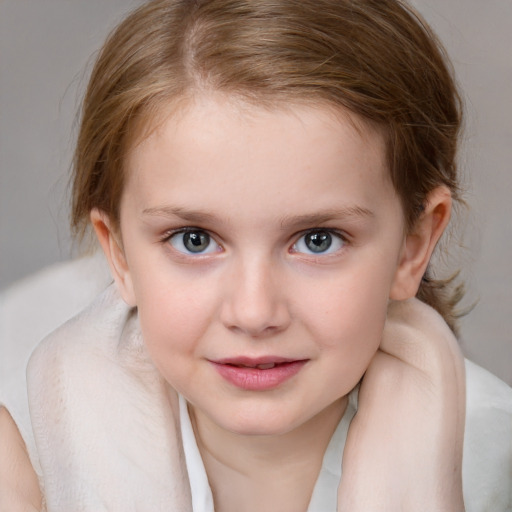 Joyful white child female with medium  brown hair and blue eyes