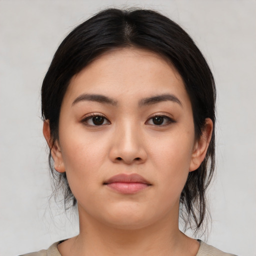 Neutral asian young-adult female with medium  black hair and brown eyes