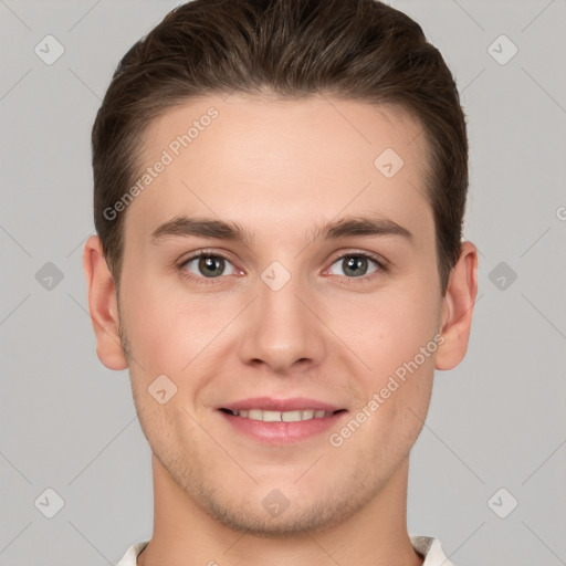 Joyful white young-adult male with short  brown hair and grey eyes