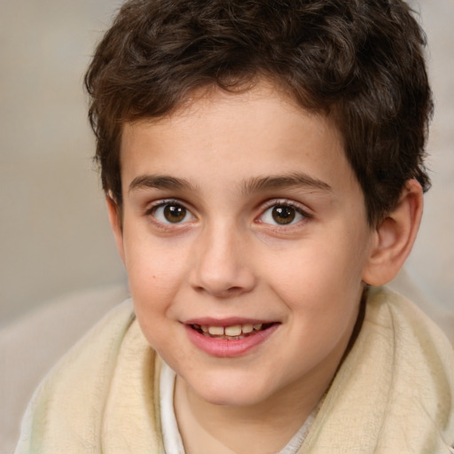 Joyful white child male with short  brown hair and brown eyes