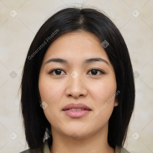 Joyful asian young-adult female with medium  brown hair and brown eyes