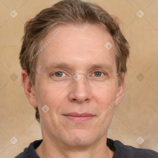 Joyful white adult male with short  brown hair and grey eyes