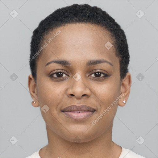 Joyful black young-adult female with short  black hair and brown eyes