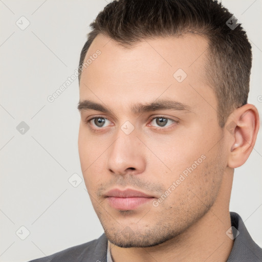 Neutral white young-adult male with short  brown hair and brown eyes