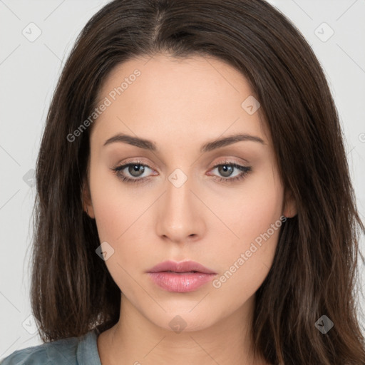 Neutral white young-adult female with long  brown hair and brown eyes