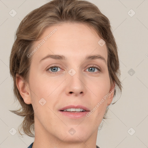 Joyful white adult female with medium  brown hair and grey eyes