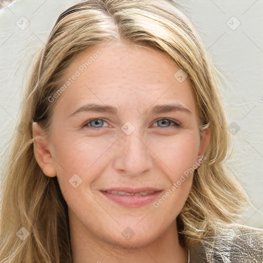 Joyful white adult female with long  brown hair and brown eyes