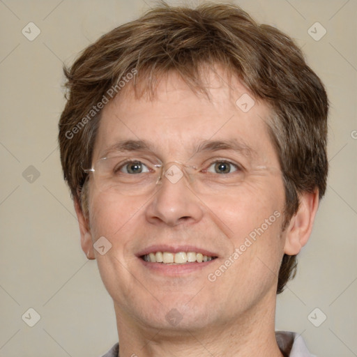 Joyful white adult male with short  brown hair and grey eyes