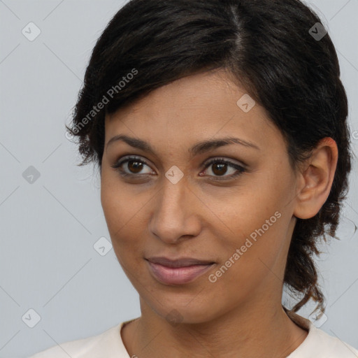 Joyful latino young-adult female with medium  brown hair and brown eyes