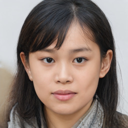 Neutral asian young-adult female with medium  brown hair and brown eyes