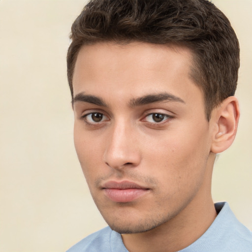 Neutral white young-adult male with short  brown hair and brown eyes