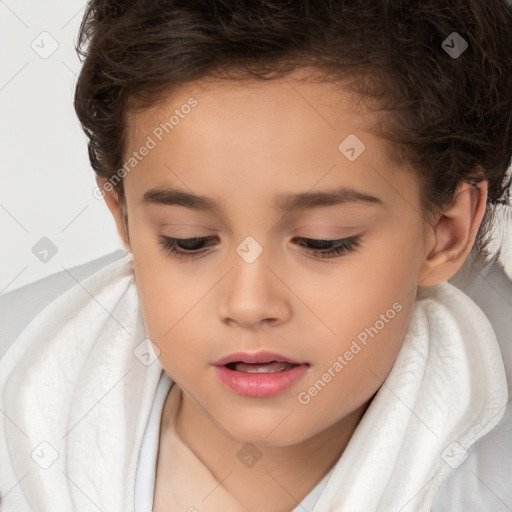 Joyful white child female with short  brown hair and brown eyes