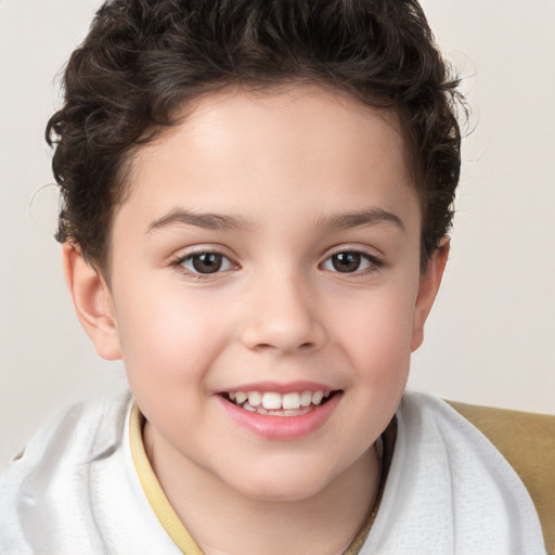 Joyful white child female with short  brown hair and brown eyes