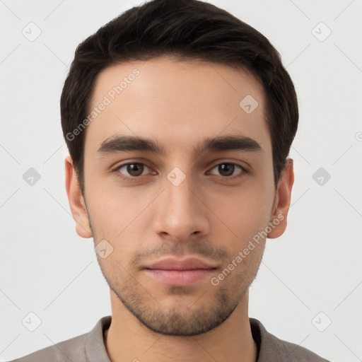 Neutral white young-adult male with short  brown hair and brown eyes