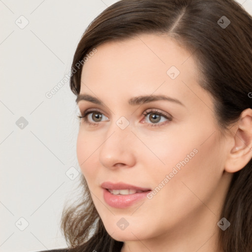 Neutral white young-adult female with long  brown hair and brown eyes