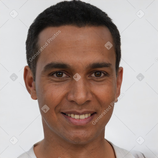 Joyful white young-adult male with short  black hair and brown eyes