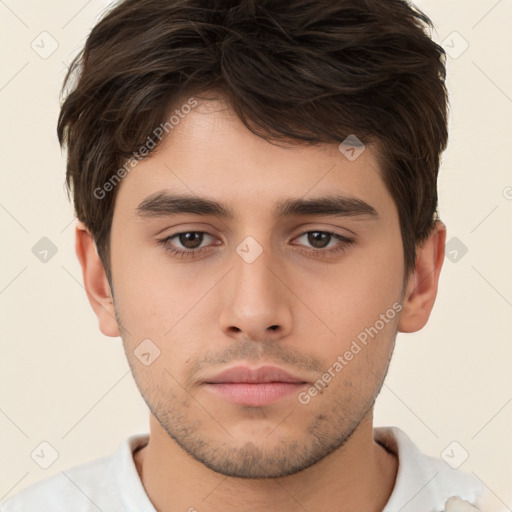 Neutral white young-adult male with short  brown hair and brown eyes