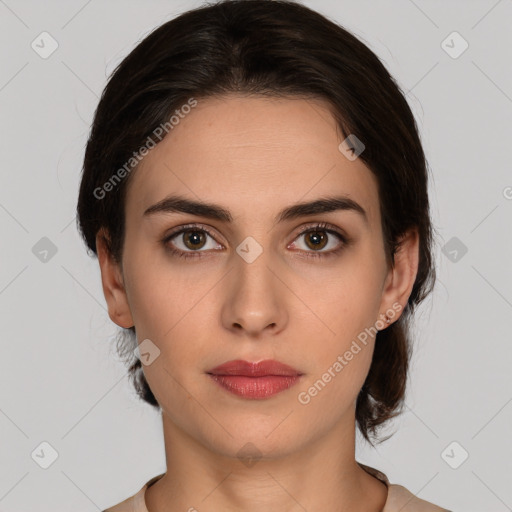 Neutral white young-adult female with medium  brown hair and brown eyes