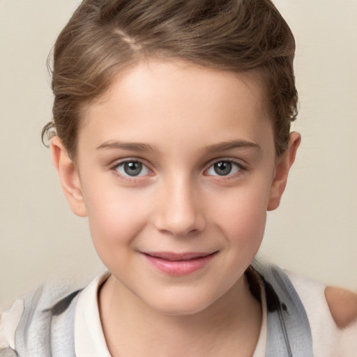 Joyful white child female with short  brown hair and brown eyes