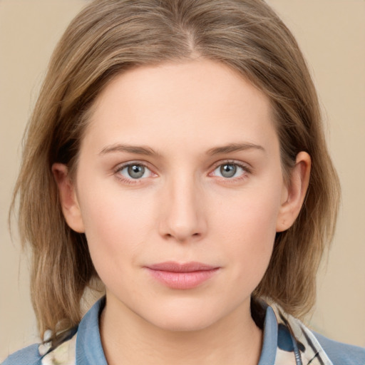 Neutral white young-adult female with medium  brown hair and grey eyes