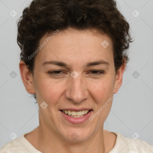 Joyful white adult female with short  brown hair and brown eyes