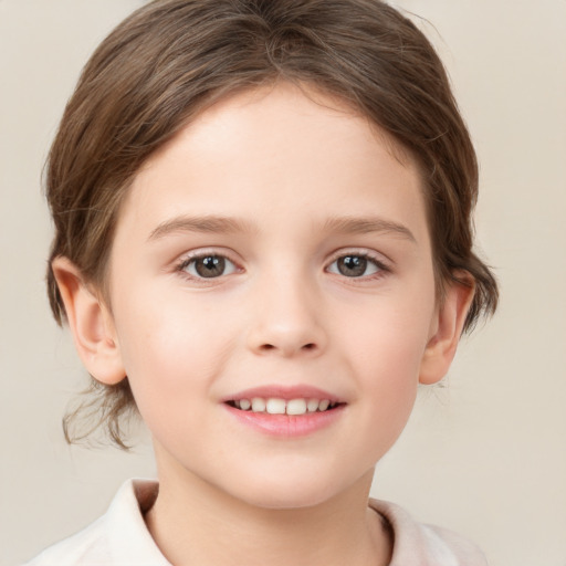 Joyful white child female with medium  brown hair and brown eyes