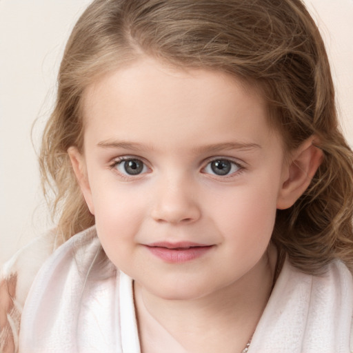 Joyful white child female with medium  brown hair and grey eyes