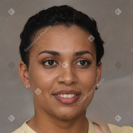 Joyful black young-adult female with short  black hair and brown eyes