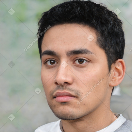 Neutral white young-adult male with short  black hair and brown eyes