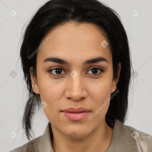 Joyful latino young-adult female with medium  brown hair and brown eyes